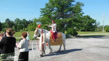 Groom on horseback during Baraat at Executive Caterers Landerhaven in Mayfield Heights OH