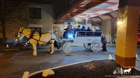 Our large Limousine Carriage giving rides during a holiday event in Elyria, OH