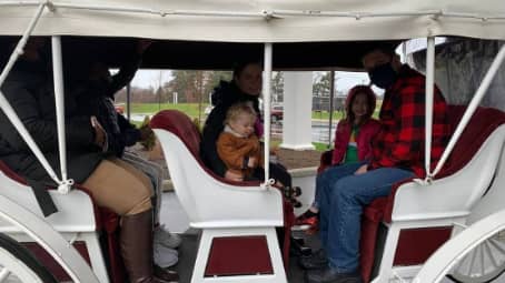 Our Stretch Victorian Carriage giving rides during a Christmas event in Medina, OH
