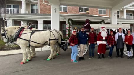 Our beautiful Stretch Victorian Carriage giving rides during a Christmas event in  Medina, OH