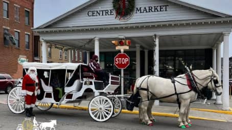 Giving rides during a holiday event with our Stretch Victorian Carriage in Wheeling, WV