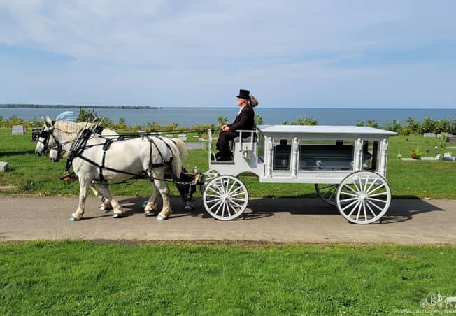 Our handcrafted Funeral Coach during a procession in Erie PA