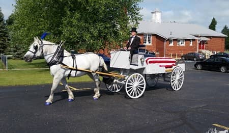 Our one of a kind horse Caisson Hearse during a funeral in OH