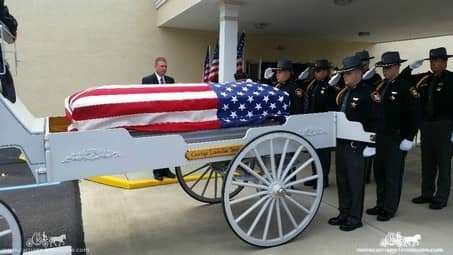 Our one of a kind Caisson Hearse at a funeral in Coshocton, OH