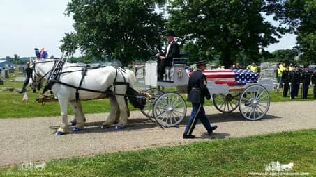 Our one of a kind Caisson Hearse at a funeral in Coshocton, OH