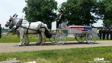 Our one of a kind Caisson Hearse at a funeral in Coshocton, OH