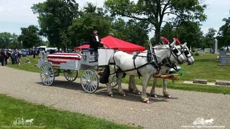 Our one of a kind Caisson Hearse at a funeral in Coshocton, OH