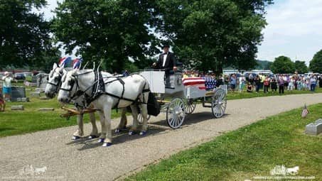 Our one of a kind Caisson Hearse at a funeral in Coshocton, OH