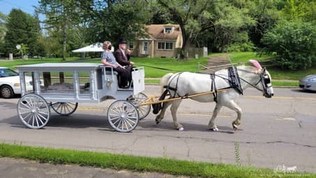 Our custom made Funeral Coach during a funeral in Youngstown, OH