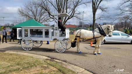 Our custom made Funeral Coach during a funeral in Canton, OH