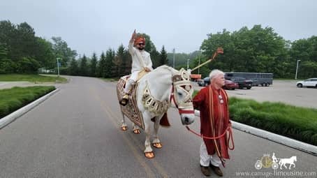 The groom riding on our Indian Wedding Horse at Geneva-on-the-Lake, OH