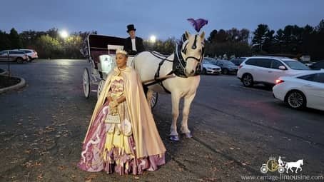 Birthday queen posing with the Victorian Carriage before entering Stan Hywet in Akron, OH